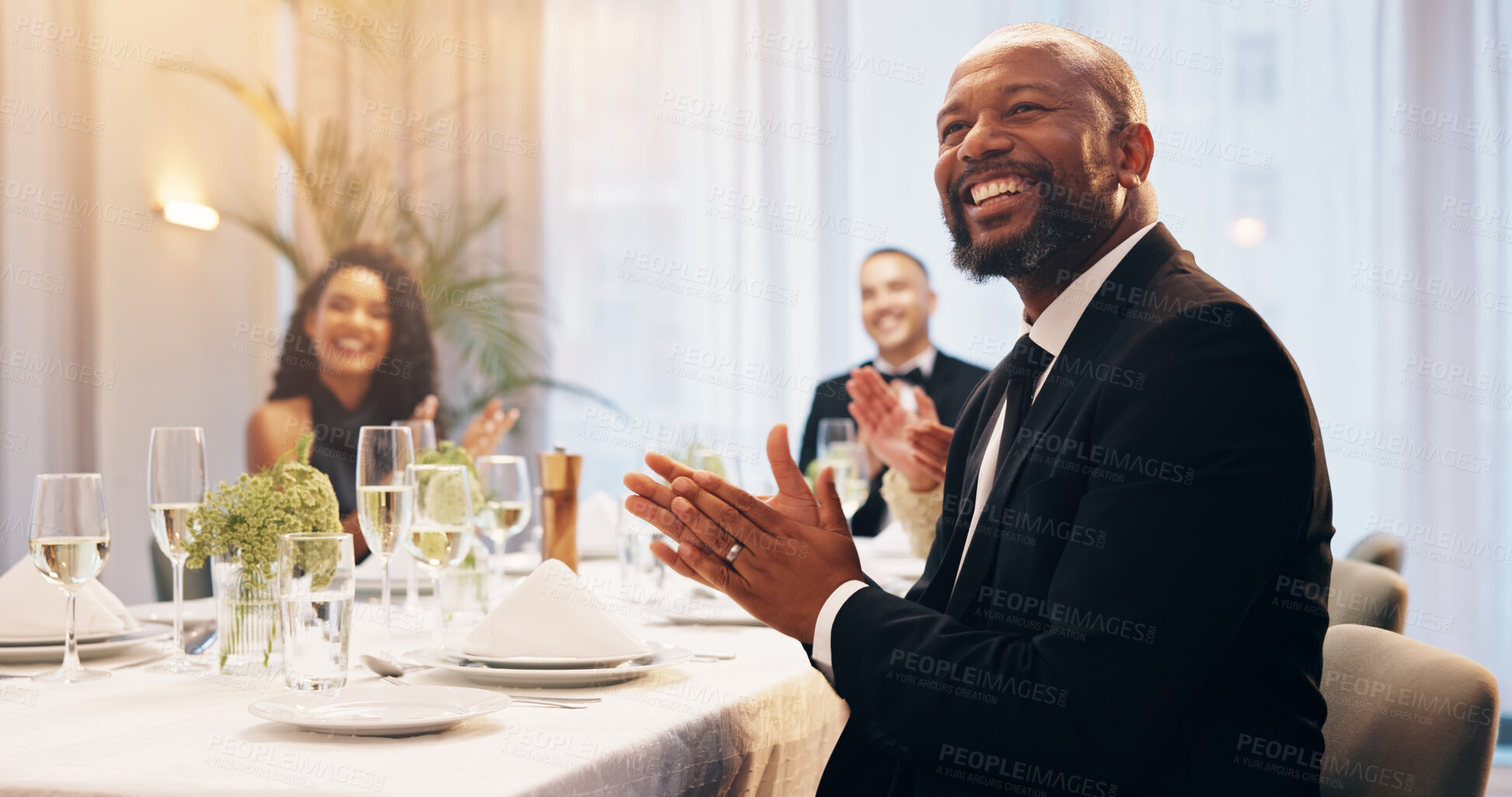 Buy stock photo Applause, champagne and man at party for celebration, social event and gathering. Glass, luxury and men and women with liquor or fine dining and speech at gala, new years eve and business dinner