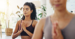 Zen, namaste and women in yoga class for meditation, self care and holistic balance at health retreat. Relax, mindfulness and girl with wellness for mind, body and soul for gratitude, peace and calm