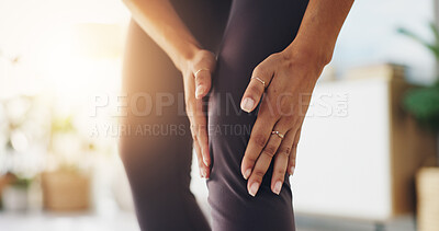 Buy stock photo Hands, injury and knee pain with person in living room of home for exercise, fitness or training problem. Accident, anatomy and emergency with athlete in apartment for recovery or rehabilitation