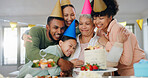 Hug, birthday and senior woman with family in home for party, celebration or fun event together. Happy, wishes and people embracing elderly female person for bonding, love and care with cake at house