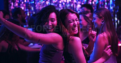 Buy stock photo Dancing, energy and friends in club, night and fun for women, bonding and celebration in weekend or group. Lights, dark and listening to music, smile and people in rave, disco or festival on New Year