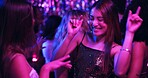 Dancing, smile and friends in club, night and fun for women, bonding and celebration in weekend or group. Lights, dark and listening to music, dancer and people in rave, disco or festival in New Year