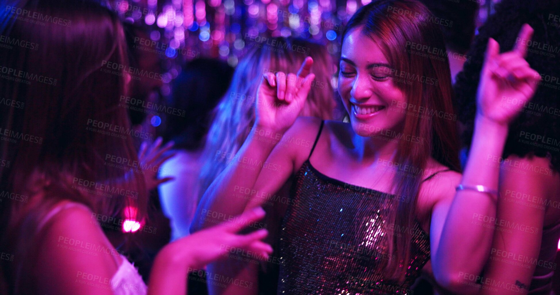 Buy stock photo Dancing, smile and friends in club, night and fun for women, bonding and celebration in weekend or group. Lights, dark and listening to music, dancer and people in rave, disco or festival in New Year