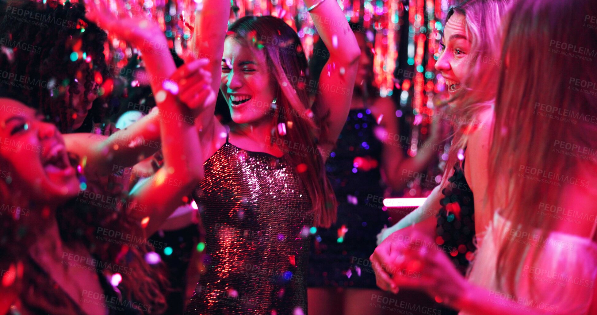 Buy stock photo Women, dance and glitter in night club for party, celebration and excited for New Year. Friends, movement and energy on dancefloor for event, disco or birthday social with neon lights for aesthetic