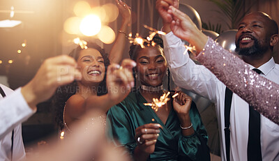 Buy stock photo Business people, party and sparklers at night for celebration, diversity and happy for new year countdown. Women, men and smile for friends with fireworks, connection or cheers in group at gala event