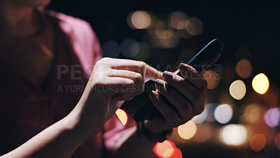 Buy stock photo Night, phone and hands of businesswoman on rooftop of office building with research for investment. Tech, closeup and female financial planner typing email on cellphone for profit dividend report.