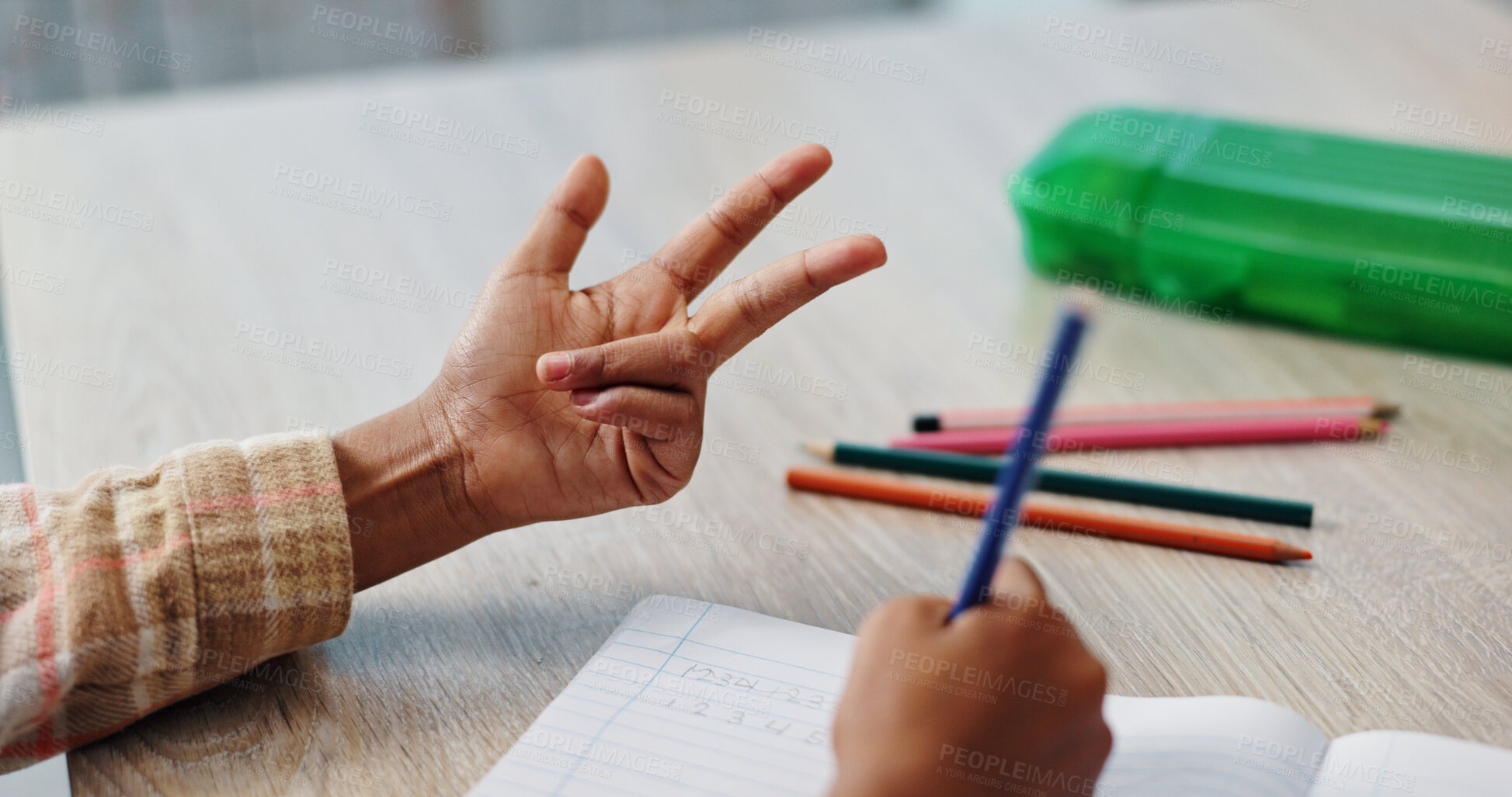 Buy stock photo Hands, counting and child in classroom, numbers and writing of homework, notebook and learning in elementary. Back to school, growth and development of kid, studying and test of math and knowledge