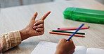 Hands, counting and child in classroom, math and writing of homework, notebook and learning in elementary. Back to school, growth and development of kid, studying and numbers for test and knowledge