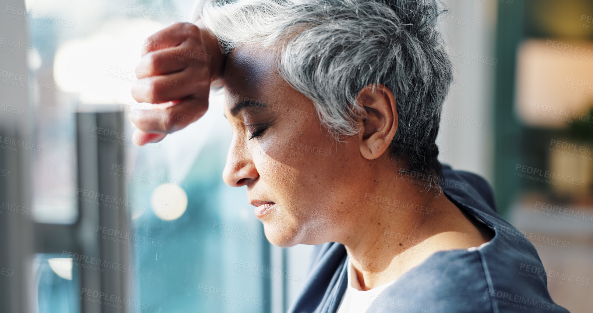 Buy stock photo Mature woman, doctor and stress at hospital window with burnout, medical fail and headache in lobby. Frustrated physician, health worker and grief from loss, thinking and healthcare doubt in clinic