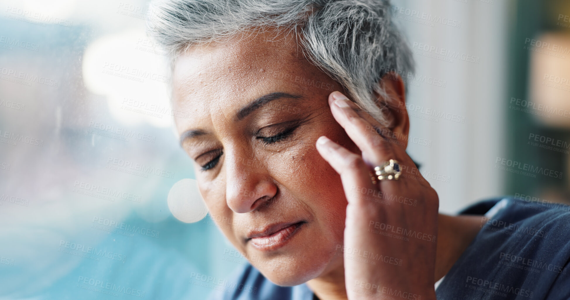 Buy stock photo Mature woman, doctor and headache at hospital window with burnout, medical fail and stress in lobby. Frustrated physician, health worker and grief from loss, migraine and healthcare mistake in clinic