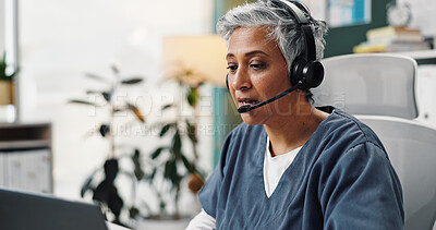 Buy stock photo Healthcare, laptop and doctor talking for telehealth consulting, medical service and online diagnosis. Hospital, digital support and mature woman with headset call for results, insurance and wellness