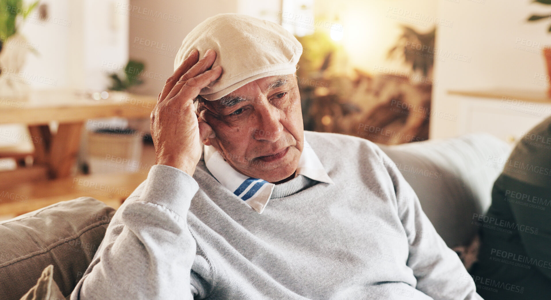 Buy stock photo Retirement, thinking and old man in house, sad and depression in living room, mental health and sofa. Contemplating, unhappy and mature person with anxiety, sickness and thoughts of senior care