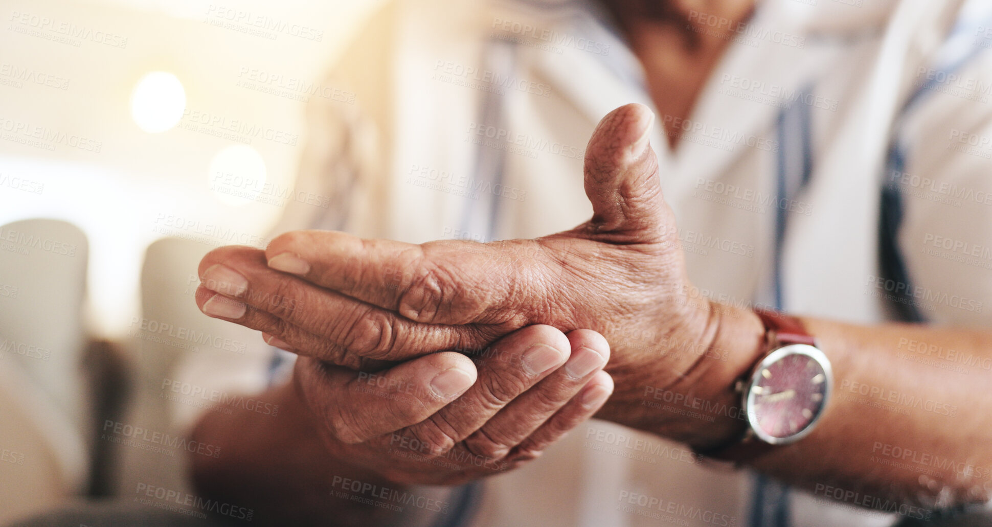 Buy stock photo Hands, senior man and arthritis or pain at nursing home for retirement, support and help. Male person, closeup and muscle ache as pensioner with old age sickness, illness and inflammations or disease