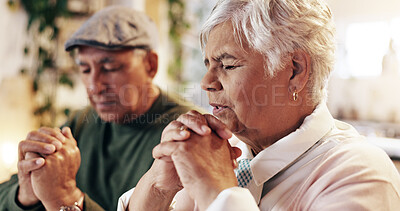 Buy stock photo Retirement, praying and couple with faith, home and respect for God, worship and gratitude for holy spirit. Christian, old man and woman with praise to Jesus, talking and peace with belief and heaven