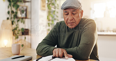 Buy stock photo Bible, reading and man in living room with prayer, studying and spiritual education by table. Praying, learning and christian testament with worship, book and praise for healing, faith and hope