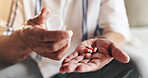 Hands, capsule and bottle in closeup for person with drugs, routine and schedule for health in home. Elderly patient, pills and pharma product for supplements, wellness and benefits in retirement