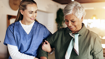 Buy stock photo Senior woman, nurse and helping hand for walking, balance and happy for progress, wellness and care in home. Caregiver, smile and elderly person with disability, rehabilitation and steps to recovery