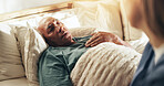 Bed, senior man and nurse with checkup for support, monitor health and wellness for healthcare. Home, caregiver and elderly patient in retirement for medical condition, cancer and resting in bedroom