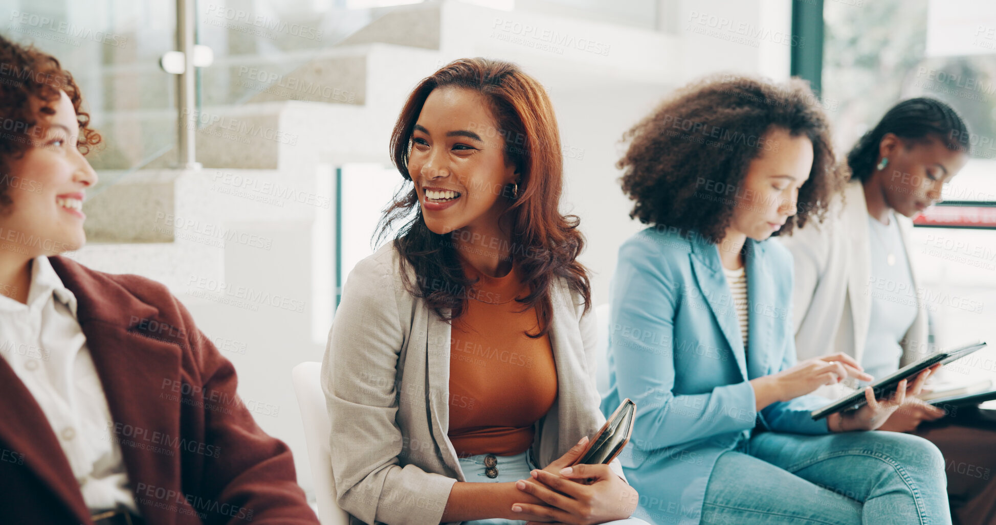 Buy stock photo Business, women and happy in row for job interview with conversation and sharing information. Candidates, people and smile with discussion at office for career opportunity, growth and development