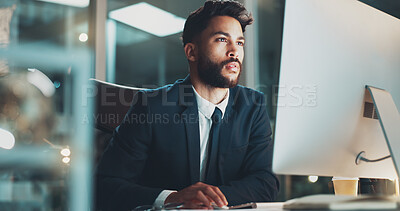 Buy stock photo Computer, night and reading with business man at desk in office for administration or research. Information, internet and report with serious employee typing on PC for deadline or overtime at work