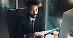 Computer, documents and night with business man at desk in office for administration or research. Information, paper and report with employee reading at PC for deadline or overtime in workplace