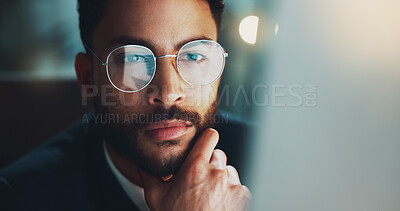 Buy stock photo Night, glasses and man in office with computer, thinking and reflection for online project at digital agency. Research, overtime and businessman at desk reading email, report or review at startup