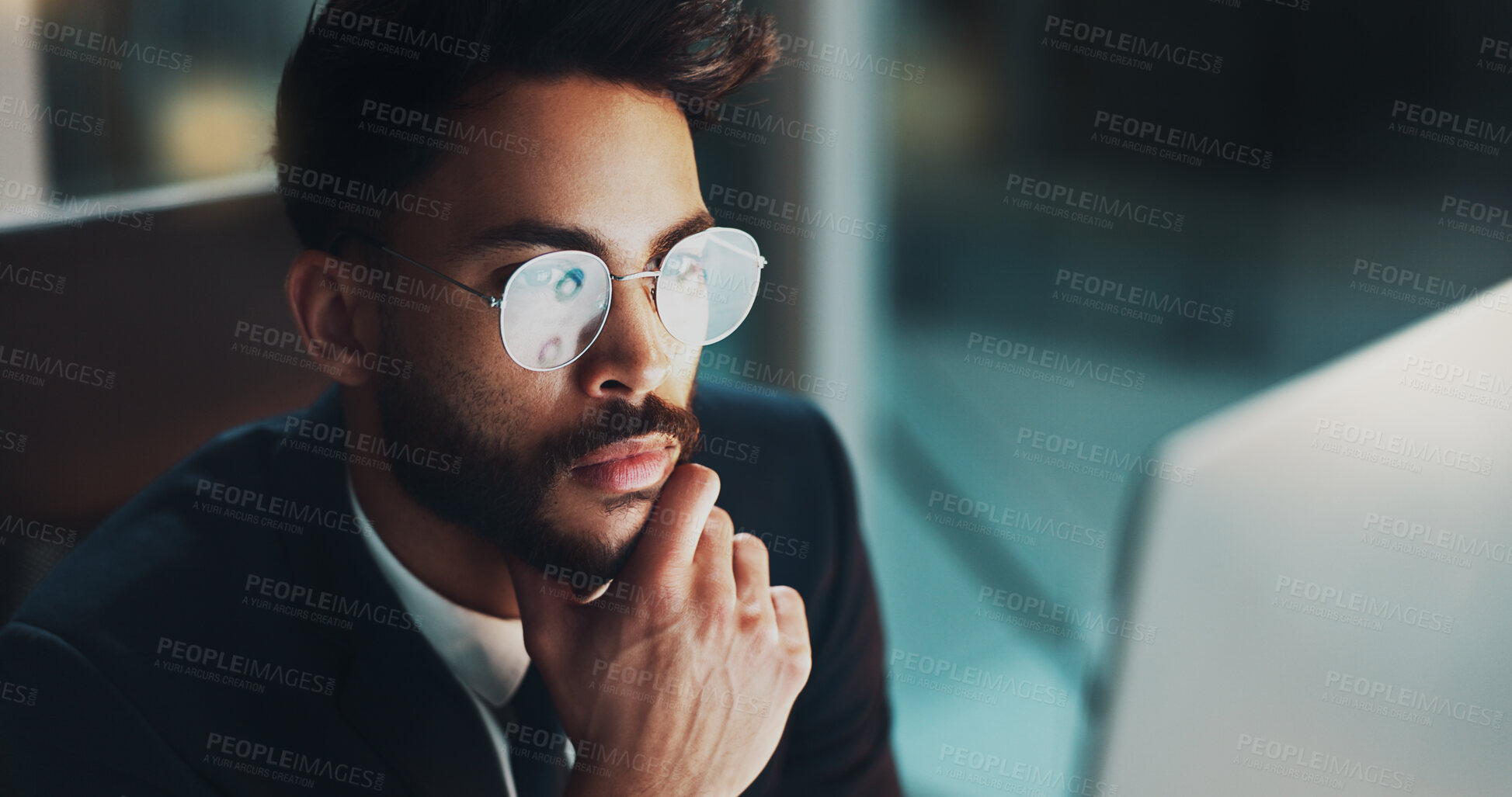 Buy stock photo Night, glasses and man in office with laptop, thinking or reflection for online project at digital agency. Research, overtime and businessman at desk reading email, report or business plan at startup