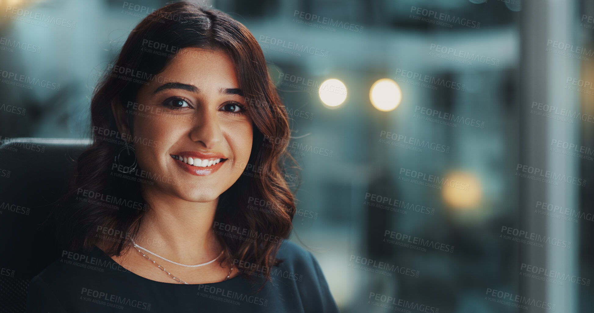 Buy stock photo Night, smile and portrait of Indian woman in office with confidence, opportunity and ambition at startup agency. Business, professional and happy consultant with pride, overtime and working late.