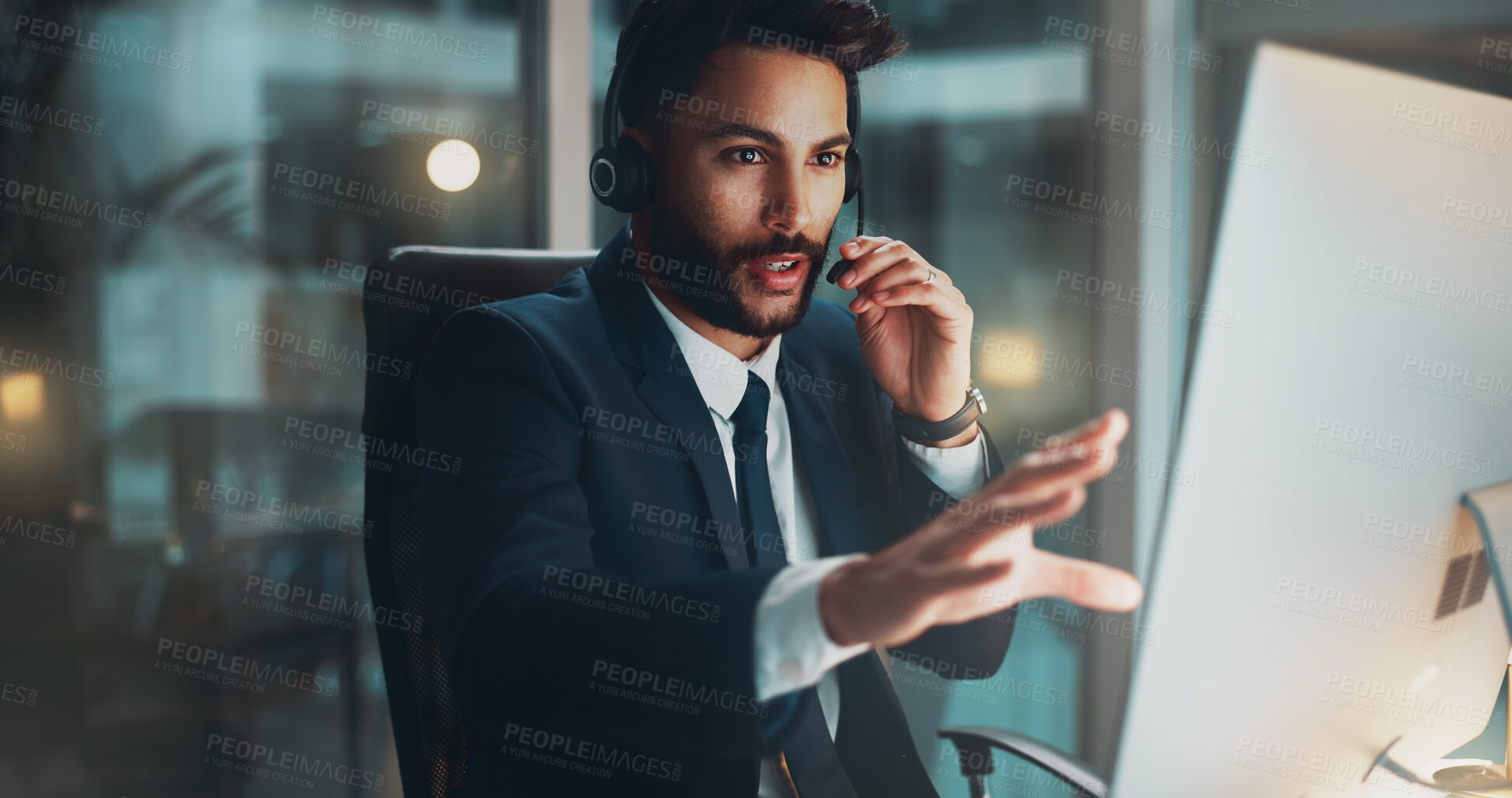 Buy stock photo Call center, computer and man in office at night for international technical support consultation online. Headset, tech and male customer service agent with multilingual translation for global client