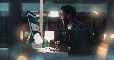 Buy stock photo Computer, night and smile with business man at desk in office for administration or research. Information, reading and report with happy employee typing on PC for deadline or overtime in workplace