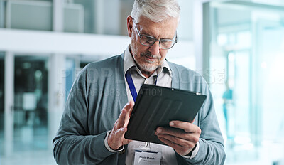 Buy stock photo Mature man, office and tablet with reading, thinking and planning for business deal or negotiation. Male person, tech and communication with scroll on website as project management in firm or company