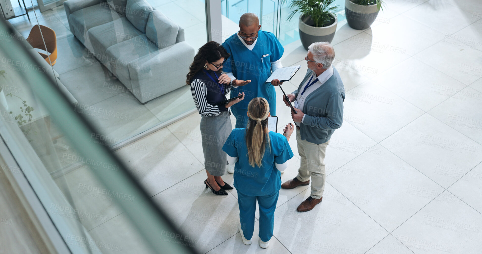 Buy stock photo Medical team, people and meeting at hospital for report, results and progress on healthcare project or feedback. Above, coworking and employees in discussion with brainstorming, planning and strategy