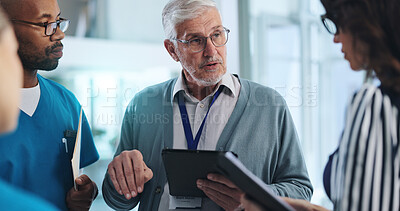 Buy stock photo Medical team, tablet and meeting in clinic with research, innovation and feedback for surgery. Mature hospital CEO, people or tech in lobby with results, advice or professional opinion for healthcare