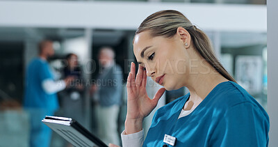 Buy stock photo Woman, nurse and stress in hospital with tablet, results and bad news in healthcare. Surgeon, tech and anxiety in lobby for research findings, patient report and overworked with fatigue or headache