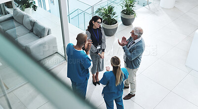 Buy stock photo Medical team, people and happy at office with applause for success, achievement and well done on promotion. Above, employees and smile on meeting in healthcare with clapping hands and congratulations