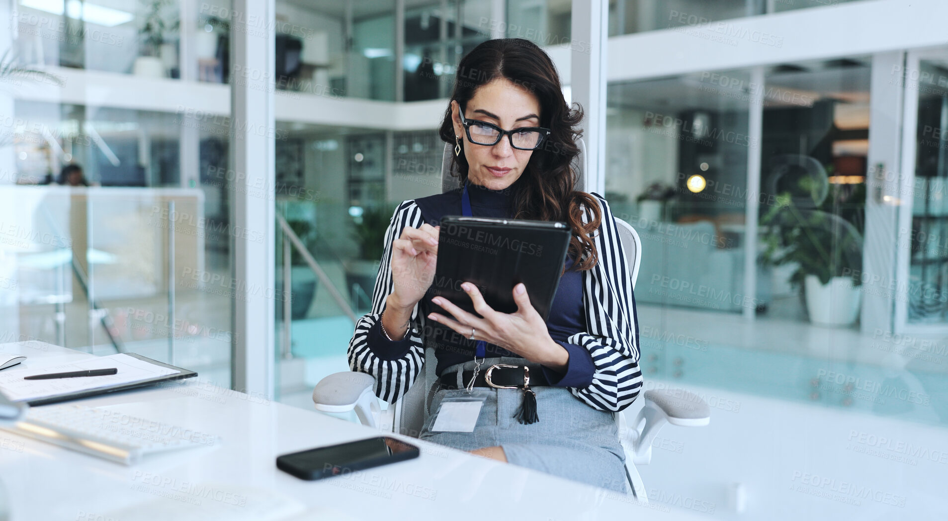 Buy stock photo Mature woman, office and computer with reading, work and research for business deal or negotiation. Female person, ideas and communication for email, website and project management in firm or company