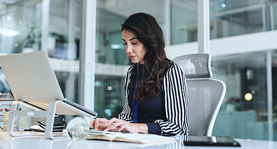 Buy stock photo Business woman, laptop and typing with notebook for accounting, email or finance at office desk. Female person, accountant or secretary working on computer for communication or schedule at workplace