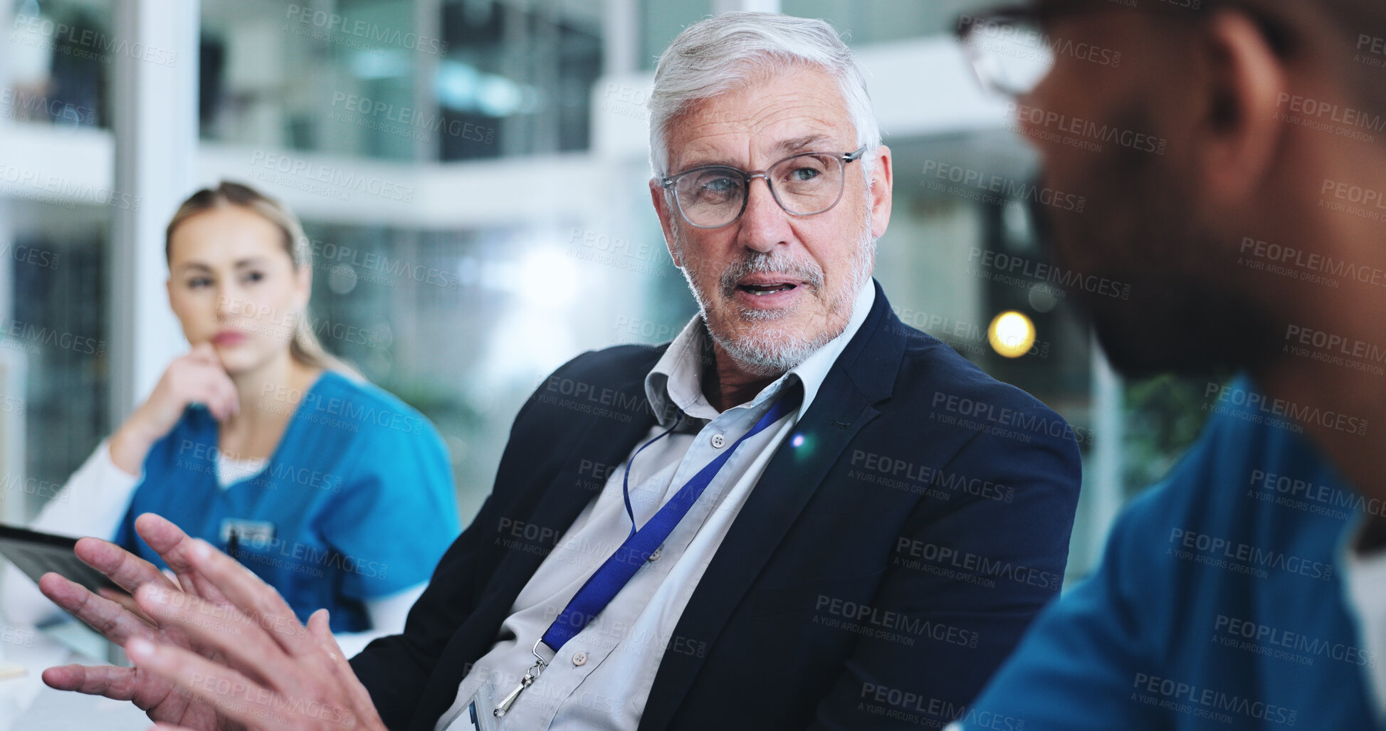 Buy stock photo Medical team, employees and meeting at boardroom for report, results and progress on healthcare project. Hospital, coworking and people in discussion with brainstorming, planning and strategy