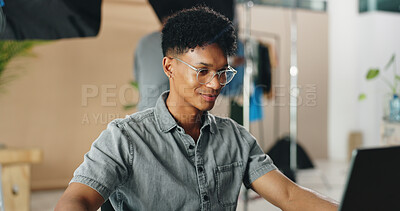 Photography, fashion and laptop with man in studio for magazine production, backstage and editing. Artist, photoshoot and creative with person for ecommerce online catalog, shooting and picture