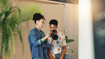 Photographer, fashion and team with model in studio for magazine production, backstage and wardrobe set. Artist, photoshoot and creative with person for ecommerce catalog, shooting and picture