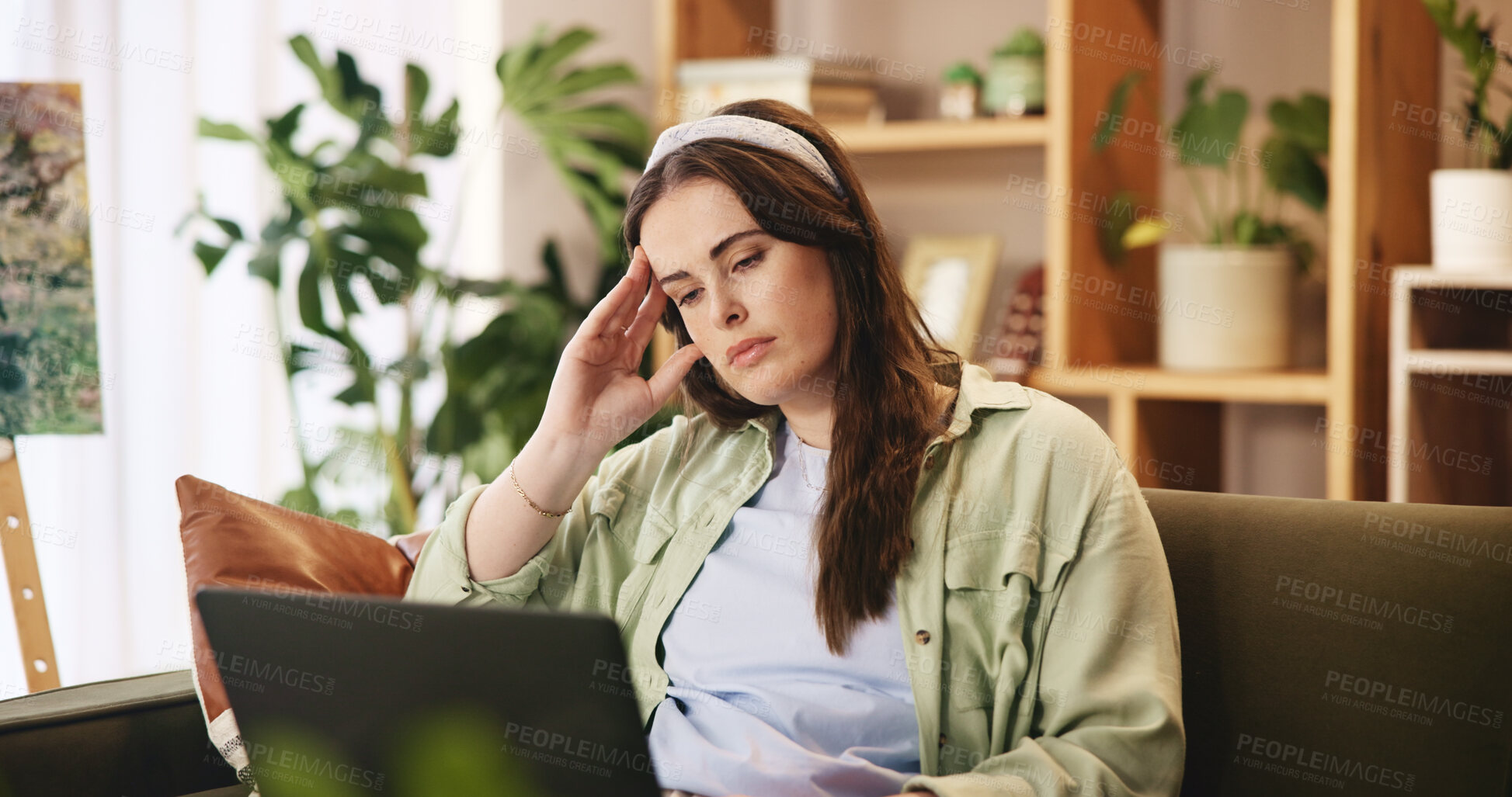 Buy stock photo Thinking, tired and woman on sofa with laptop with stress for exam, test and assessment for university. Burnout, home and girl with worry, frustrated and problem for studying, education and learning