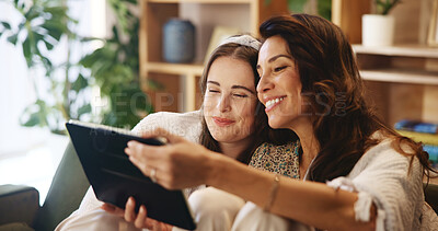 Buy stock photo Home, mother and daughter with tablet for laughing, comedy movie and streaming series with subscription. Sofa, mature mom and adult child with digital for watch video, entertainment and online joke