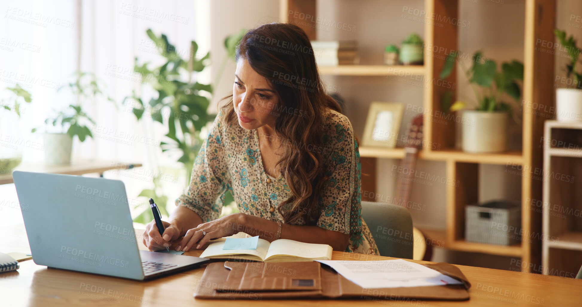 Buy stock photo Laptop, notes and mature woman in home office with online research, business plan and paperwork. Remote work, freelance consultant or businesswoman at desk with computer, notebook and writing ideas