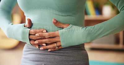 Buy stock photo Living room, woman and hands with stomach pain for diarrhea, menstruation and constipation of virus. Female person, home and abdomen with tummy ache for ibs cramps, gastro problem and digestion issue