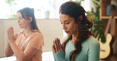 Buy stock photo Meditation, prayer hands and mature mother with daughter for health, zen and spiritual wellness. Balance, mindfulness and healing aura with people at home for yoga exercise, awareness and energy