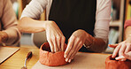 Pottery class, hands or woman with clay sculpture for molding texture, lesson or art product. Closeup, workshop or creative artists learning in small business with hobby, activity and craft project