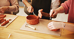 Pottery class, hands and people with clay sculpture for molding texture, production and art product. Closeup, workshop or creative artists learning in small business with pot shape and craft project