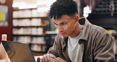 Buy stock photo African, man and student with laptop in library for research information, university news and study schedule. Person, digital and reading online with education survey, exam results and project report