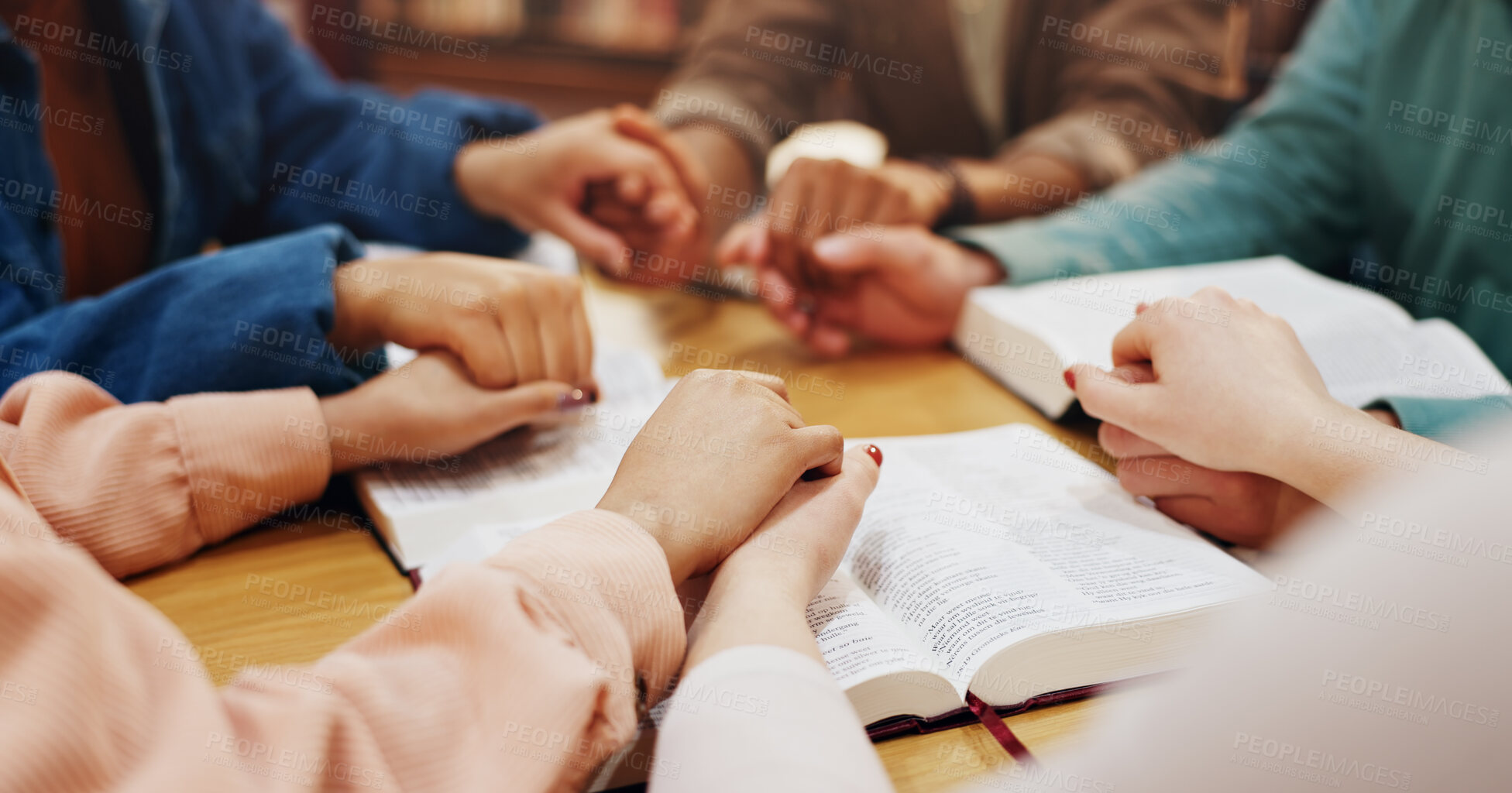 Buy stock photo Bible study, holding hands and group with faith, praying and friends with belief, Christian and God. Respect, spiritual and circle of people, table and worship of holy spirit, guide and learning