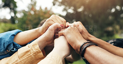 Buy stock photo Hands, students and fist for teamwork outdoor with education support, learning success and studying. People, friends and collaboration with college future, scholarship and celebration of synergy goal